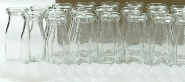 Half Pint (236ml) Glass Bottles and Lids Combo Pack - 24 half pint bottles and 36 clear 56 mm Frigiseal lids per case - Ships Free Within Canada